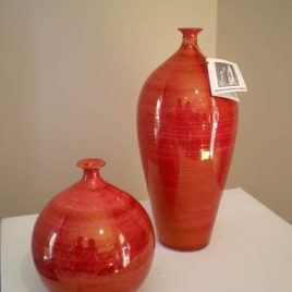 Round Red and Red Oval Bottles